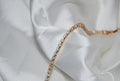 Pulseira dourada tipo rivière com zircónias