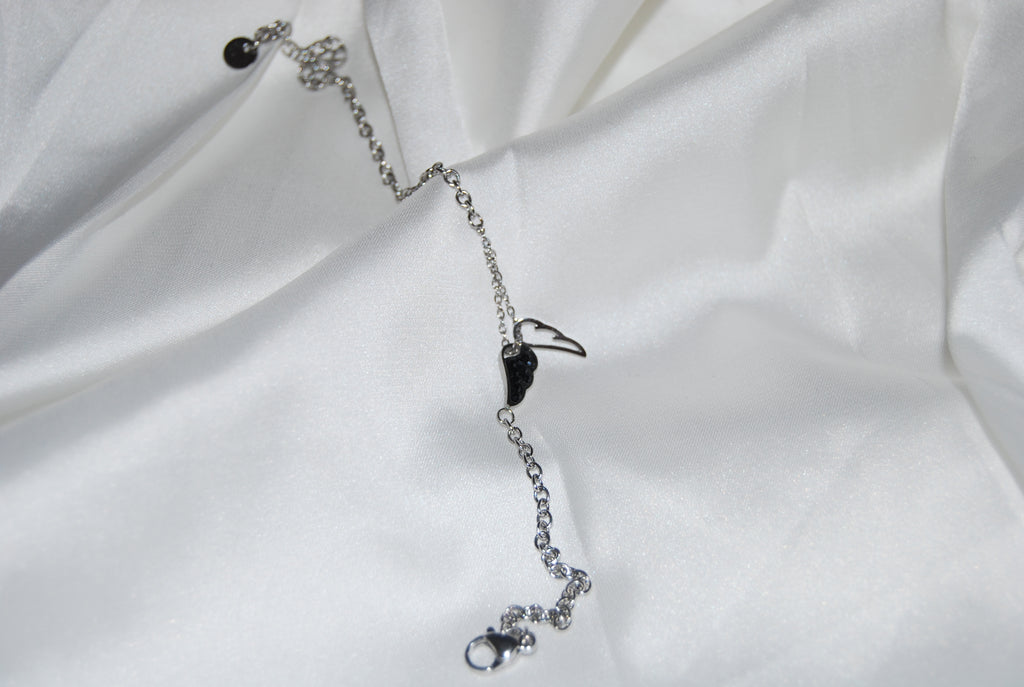 Pulseira com asas e zircónias pretas