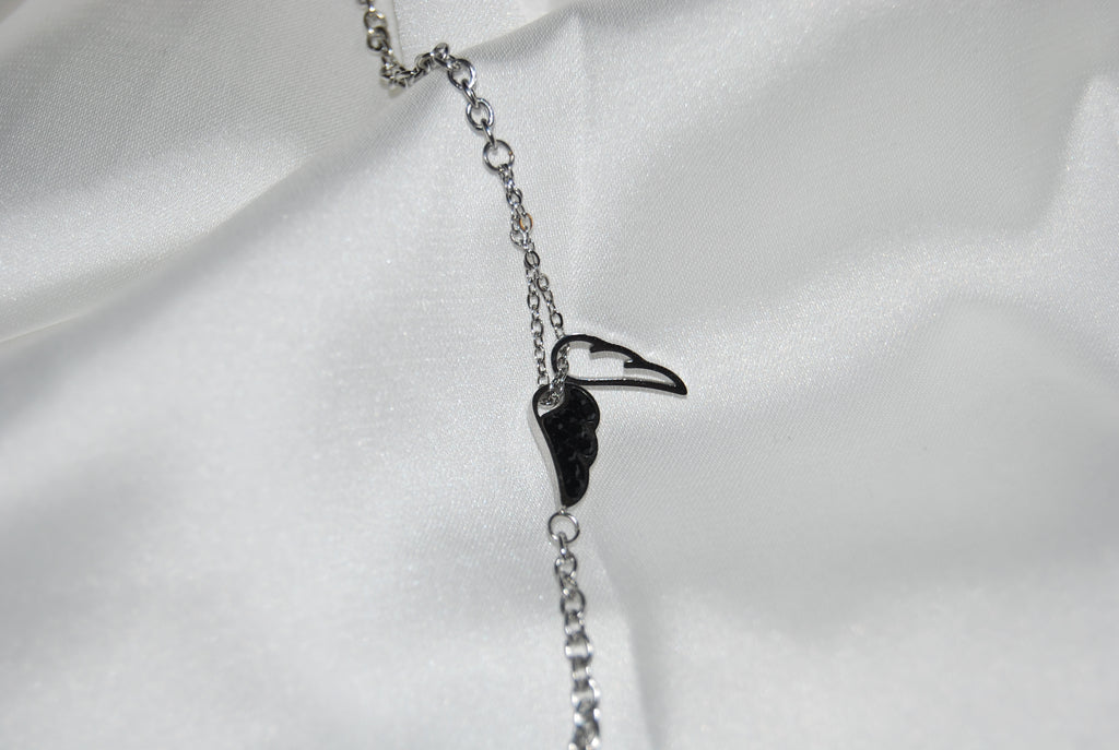 Pulseira com asas e zircónias pretas