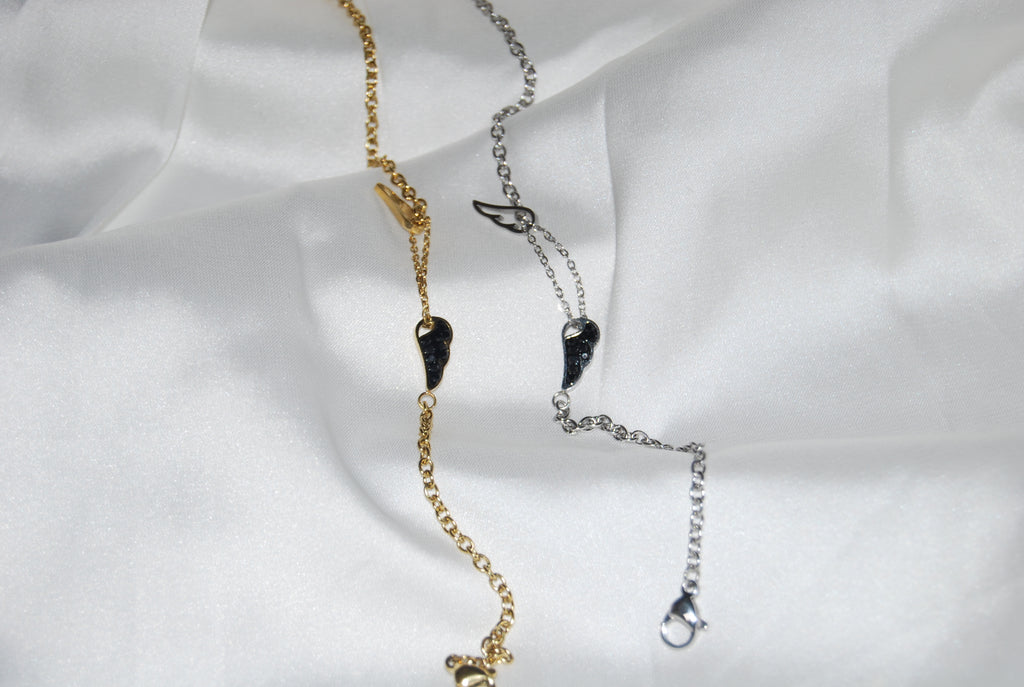 Pulseira com asas e zircónias pretas