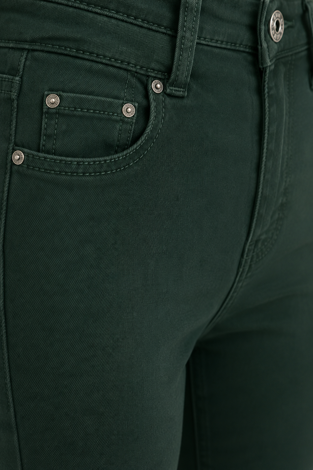 Push-up trousers that enhance the figure, in green and beige.