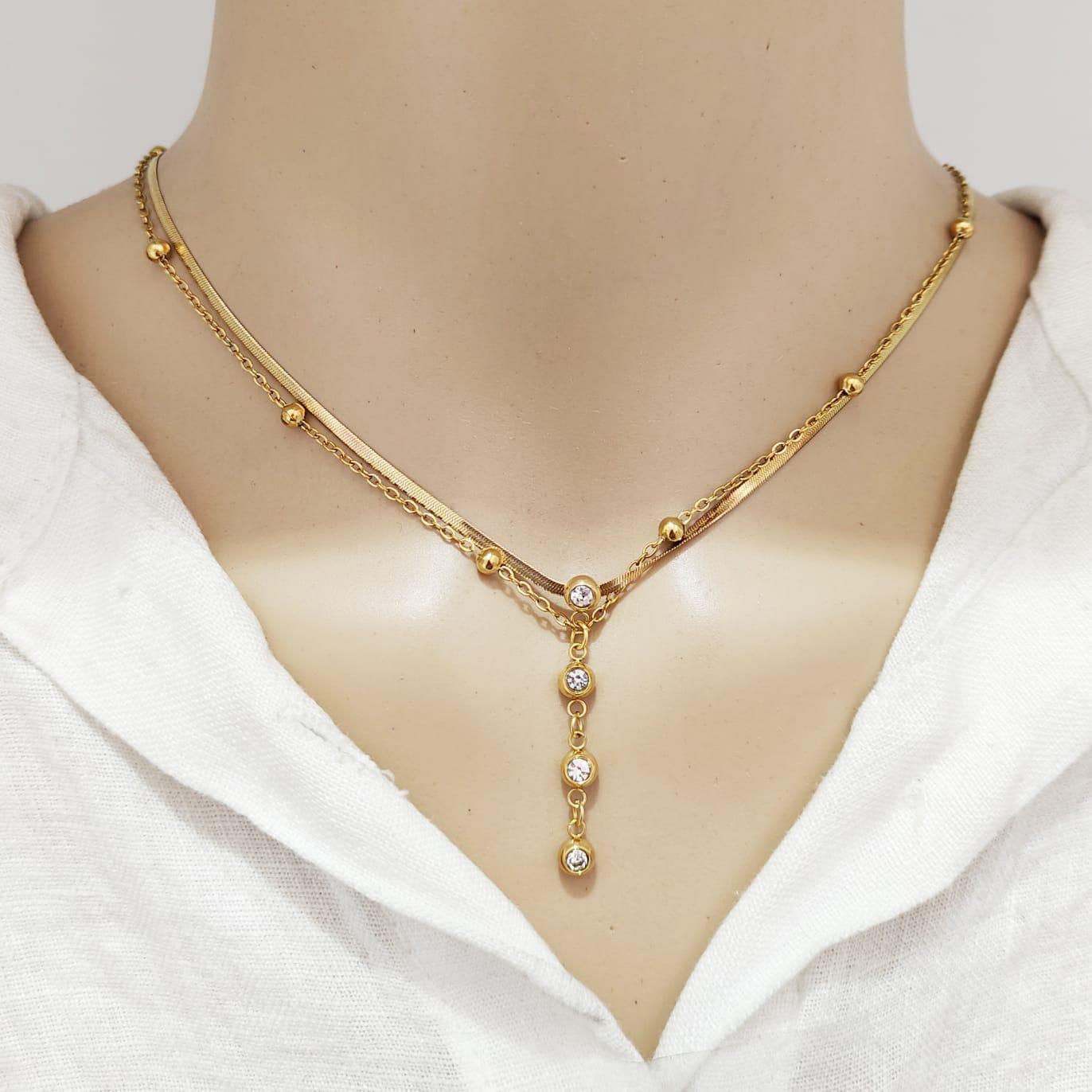 Colar Duplo Dourado com Pendente Lariat de Zirconias em Aço Inoxidável